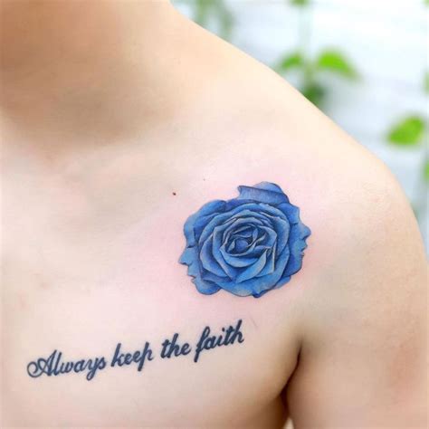 A Blue Rose With The Words Always Keep The Faith Tattooed On Its Chest