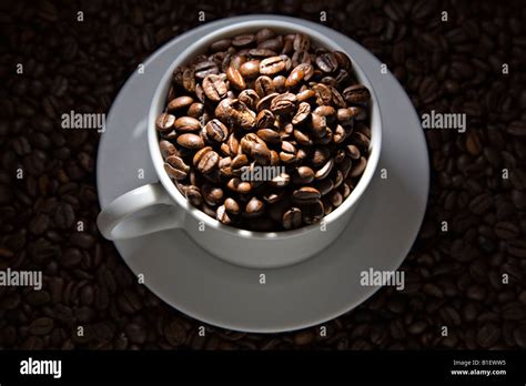 Coffee Cup Filled With Coffee Beans Stock Photo Alamy