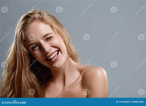 Closeup Of Woman Playfully Winking At Camera Stock Image Image Of