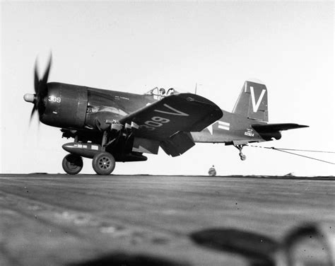 Asisbiz Vought F4U 4B Corsair VF 113 White V309 BuNo 62924 Landing CV