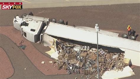 Rolled Semi Truck Spills Kegs Along I 17