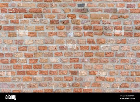 Old Red Brick Wall As Seamless Texture Or Background Stock Photo Alamy