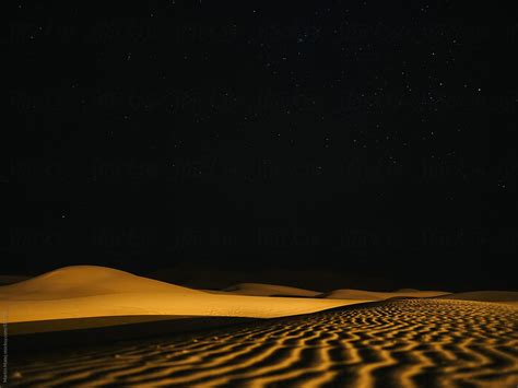 Lines In The Sand Leading To A Dune At Night By Stocksy Contributor