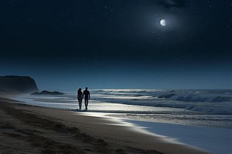 Premium Photo Couples Strolling Along A Moonlit Beach