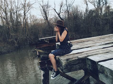 "Woman Playing Harmonica On Bridge" by Stocksy Contributor "Kevin Russ ...