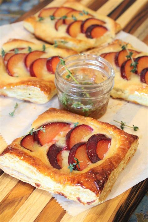 Flakey Puff Pastry Filled With Fresh Plums Frangipane And Glazed With