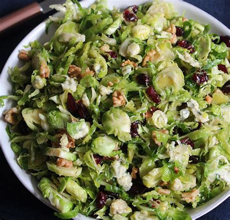 Shredded Brussels Sprouts Salad With Walnuts Cranberries And Blue