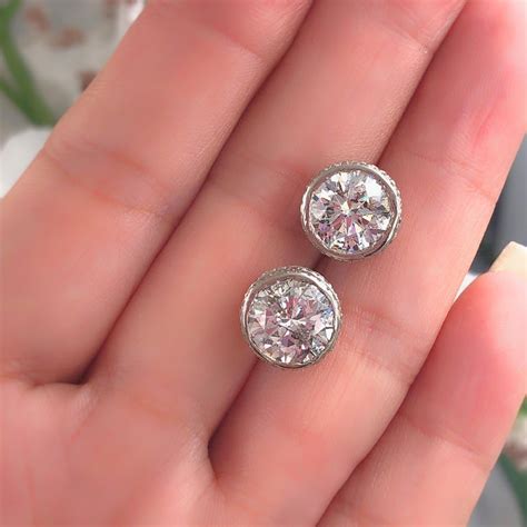 Round Diamond Bezel Set Earrings 587 Carat In 14 Karat White Gold At