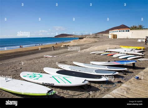 Surf boards at the beach of El Medano, a popular surfer destination on ...