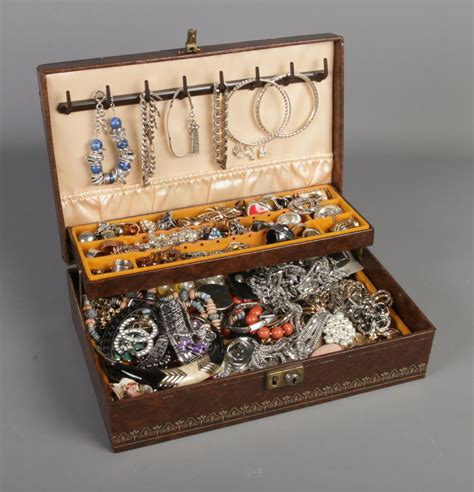 A Cantilever Jewellery Box With Contents Of Costume Jewellery Including