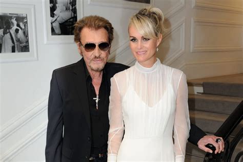 Johnny Hallyday papa adoptif à 61 et 65 ans