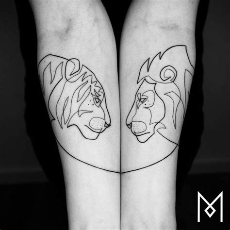 Matching Lion And Lioness Tattoos