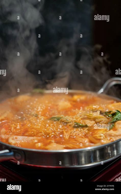 Korean Hot Pot Ramyeon And Tteokbokki In Kimchi Soup With Vegetable