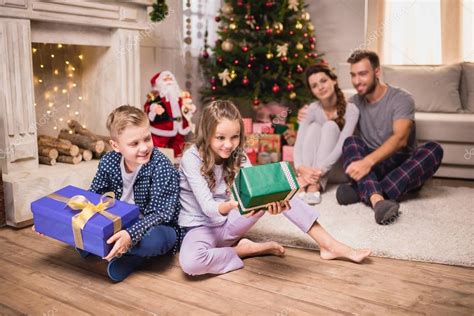 Kids with christmas presents — Stock Photo © GeneGlavitsky #164693476