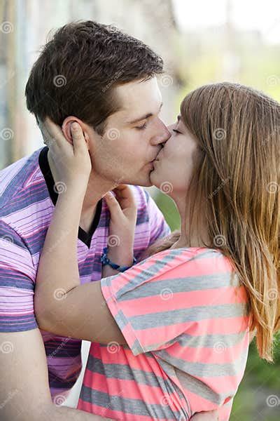 Young Couple Kissing Near Graffiti Background Stock Image Image Of Modern City 24606569