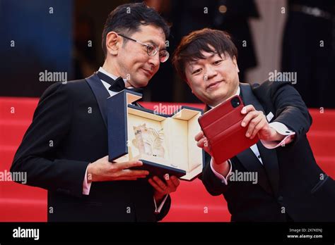 Cannes Poland 20th May 2024 Kenichi Yoda And Goro Miyazaki Hold The