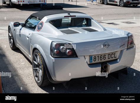 A Silver Colored Opel Speedster Two Seater Sport Car In Street Stock