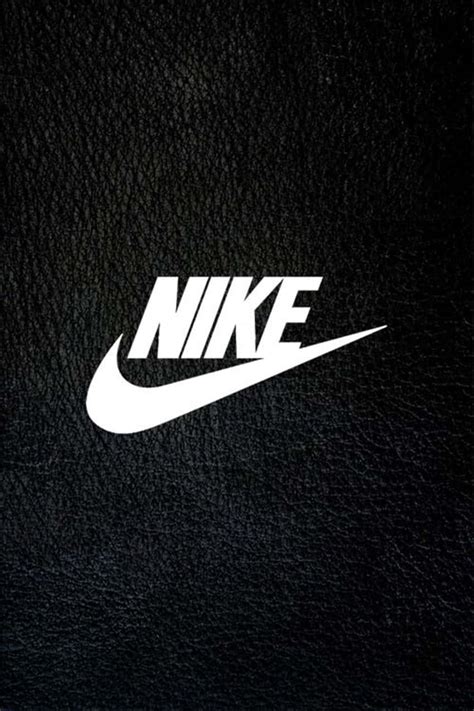 Download Nike Logo On A Black Leather Background Wallpaper | Wallpapers.com