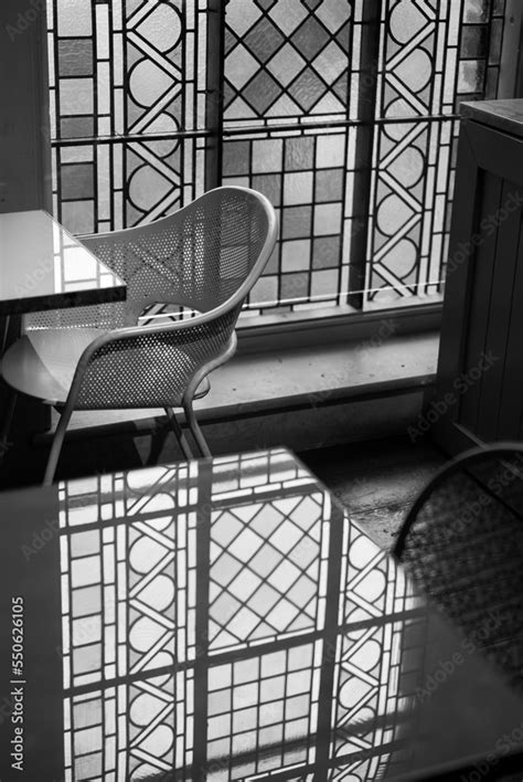 Stained Glass Windows Let Light Into A Cafe In A Deconsecrated