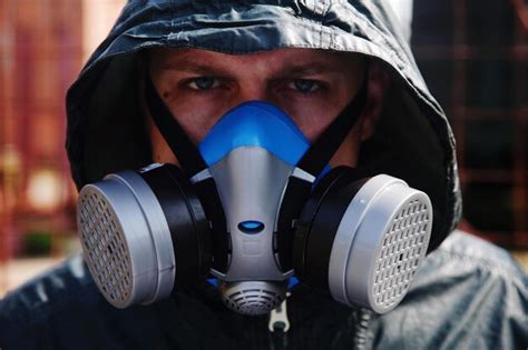 Premium Photo Close Up Portrait Of Man Wearing Gas Mask