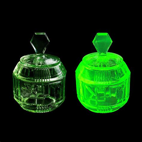 Uranium Glass Fluorescing By Science Photo Library