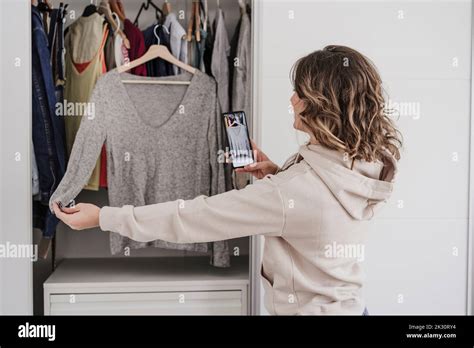 Woman Sharing Wardrobe Hi Res Stock Photography And Images Alamy