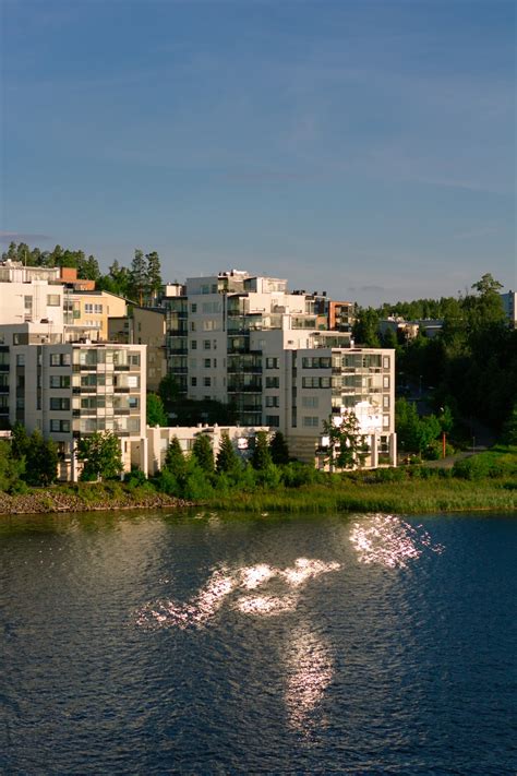 White Concrete Building Near Body Of Water During Daytime Photo Free Building Image On Unsplash