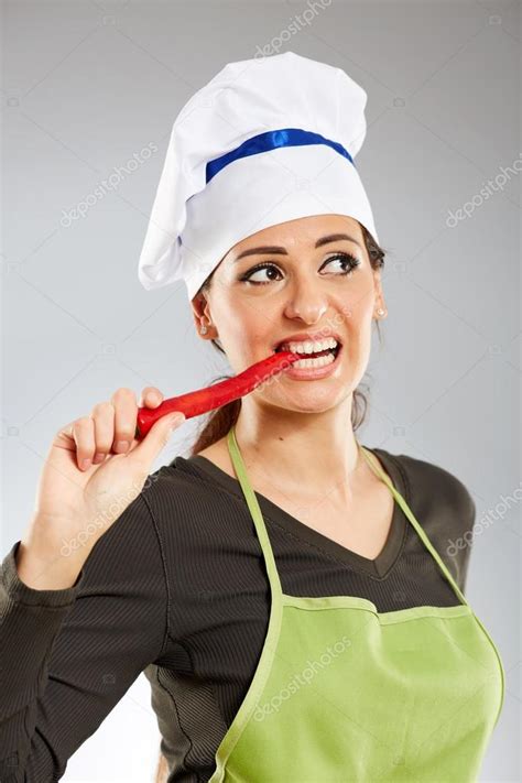 Woman Biting Hot Chili Pepper Stock Photo By Xalanx 111078970