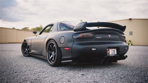 Matte Black Mazda Rx 7 On Gray Concrete Road Hd Wallpaper Wallpaper Flare