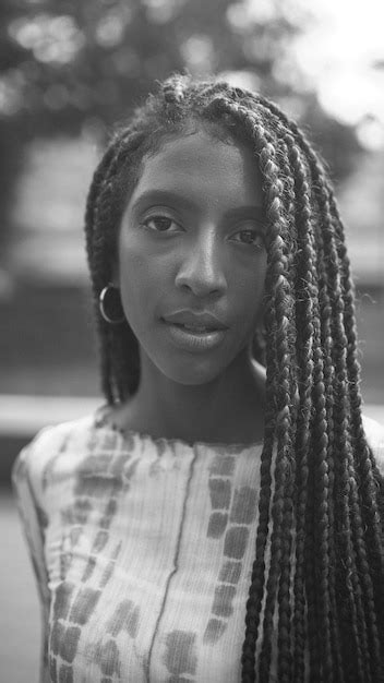 Premium Photo | Portrait of beautiful young woman with braided hair