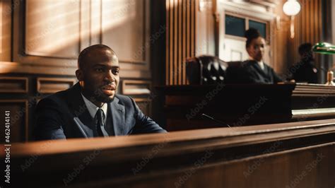 Court Of Law And Justice Trial Stand Portrait Of Handsome Male Witness Giving Testimony To