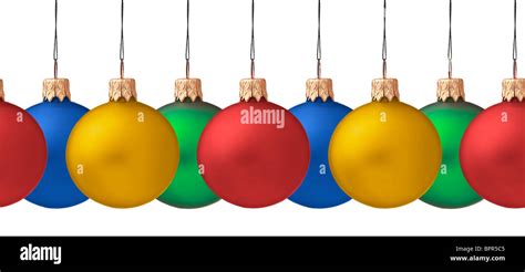 Several Hanging Christmas Baubles Isolated On White Background Stock