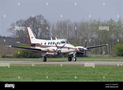 Twin-engine business airplane during landing Stock Photo - Alamy