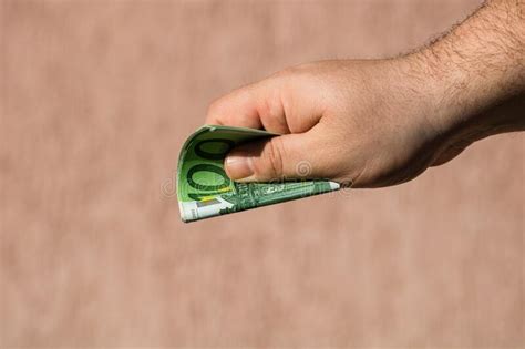 Man Hands Giving Money Like A Bribe Or Tips Holding EURO Banknotes On