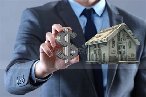 The Young Handsome Businessman In Mortgage Concept Stock Image Image