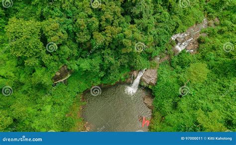 Waterfall In The Middle Of The Forest Bird Eye View Drone Stock