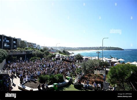 A Large Crowd Is Seen Playing Two Up During Anzac Day At Harbord