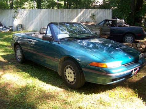 Two Mercury Capri Convertibles And A Classic Mercury Capri