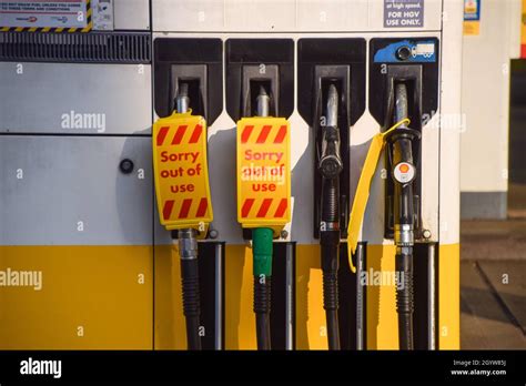 Sorry Out Of Use Signs Cover The Fuel Pumps At A Shell Petrol