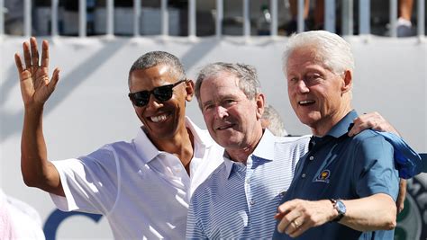 Read our favorite captions for the photo of Obama, Bush and Clinton