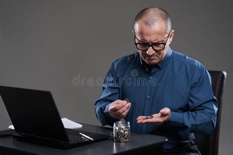 Mature Businessman Counting Pennies Stock Photo Image Of Crisis