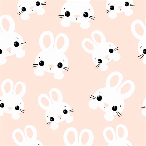 Premium Vector | A seamless pattern of white bunny faces on a pink ...