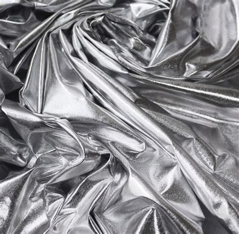 Shiny Plastic Like Fabric Used For Buttons Blouses And Furnishings 3