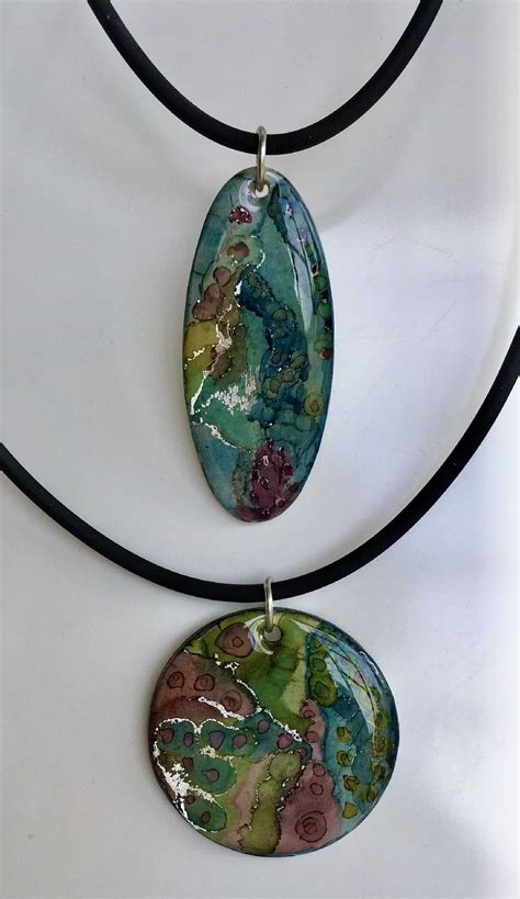 Pendants Created By Deborah Anderson With Alcohol Inks On Polymer