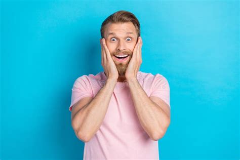 Photo Of Excited Funky Young Guy Dressed Pink T Shirt Rising Arms