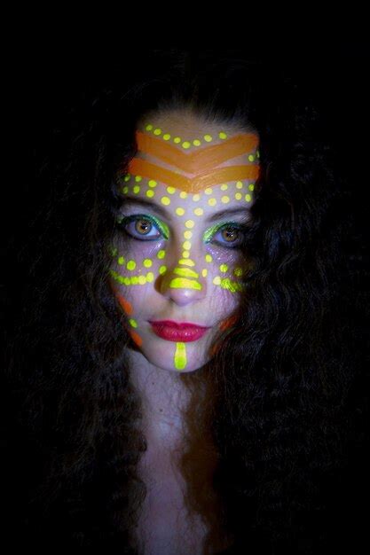 Premium Photo Close Up Portrait Of Woman With Face Paint Against