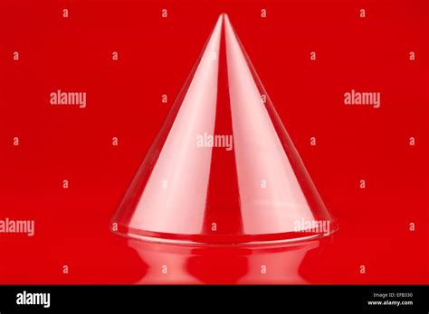Clear Plastic Cone On A Red Background Stock Photo Alamy
