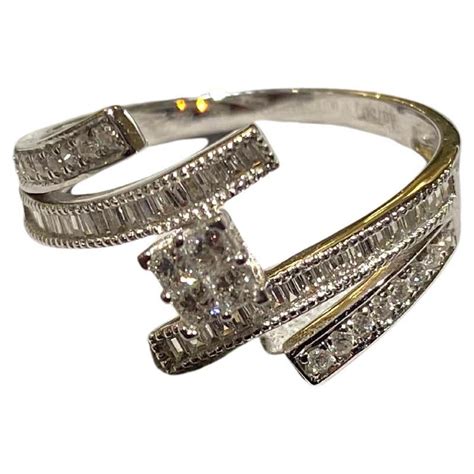 White Diamond Round And Square Design Ring In 18k White Gold For Sale