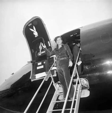 HUGH HEFNER, KING of the bunnies, steps from his all-black "Bi- 1971 ...