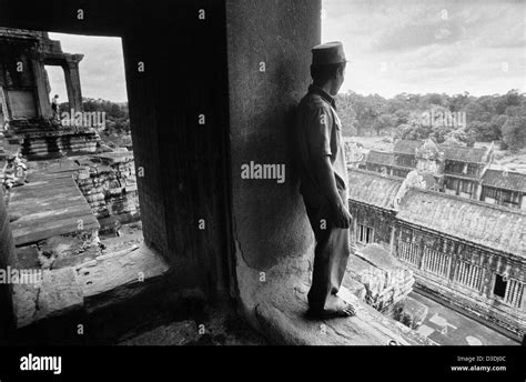 Cambodia A Soldier Keeps Watch At The Ancient Temple Of Angkor Wat